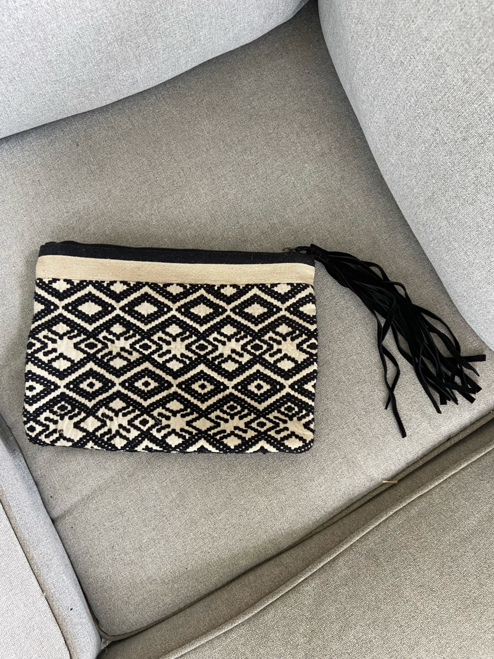 LOFT Black and Cream Woven Geometric Clutch with Tassel Accent